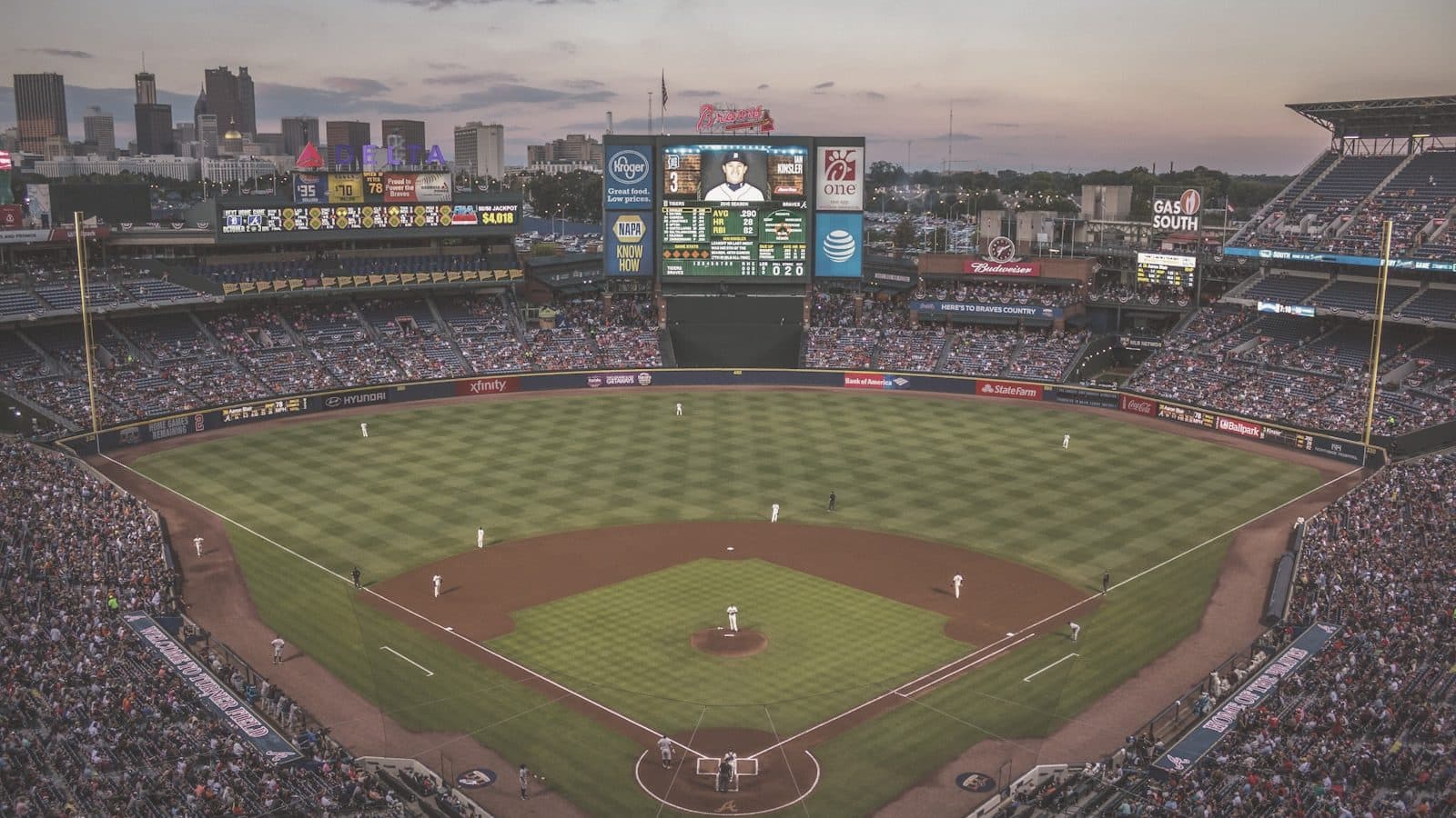 A baseball outfield at sunset