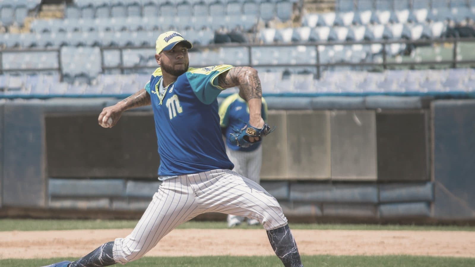 A baseball player ready in the field