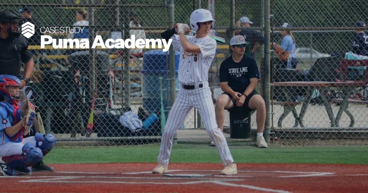 A Puma Academy hitter at the plate during a game